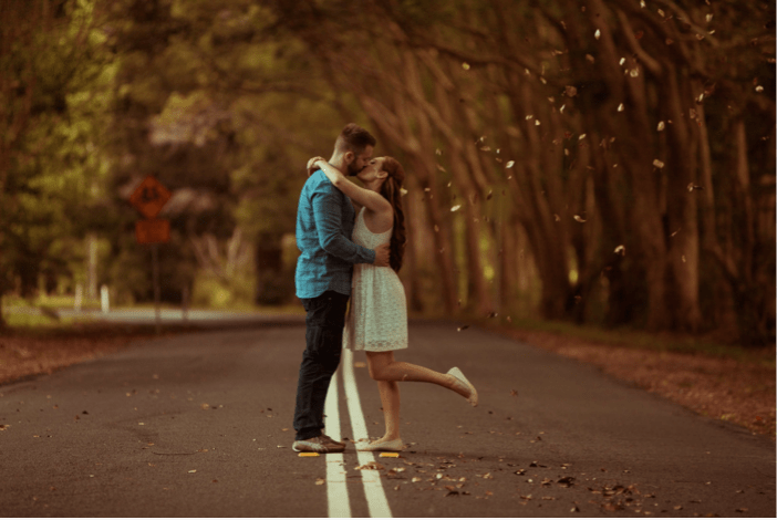 Isaac Purcell photo couple kissing in the middle of the road