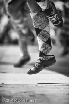 Rick Halbert girls dancing close up of tartan socks black and white