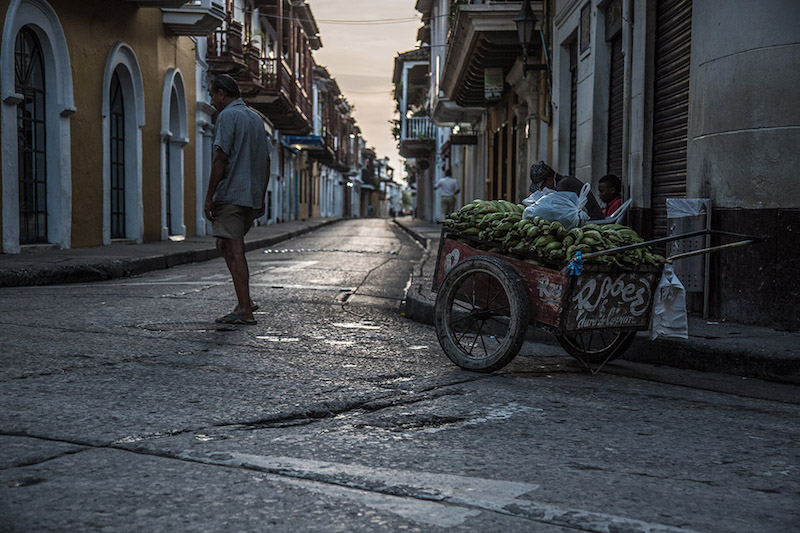 Banana seller on a quiet Columbian street