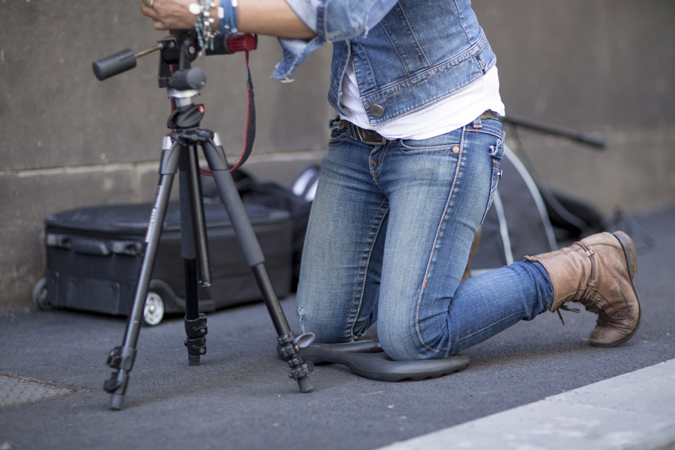 Photographer kneeling