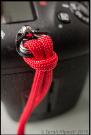 close up of red cord used as a strap