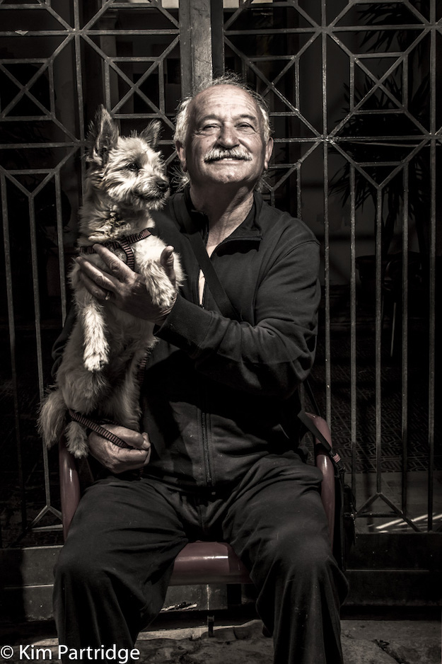 Man with dog by Kim Partridge