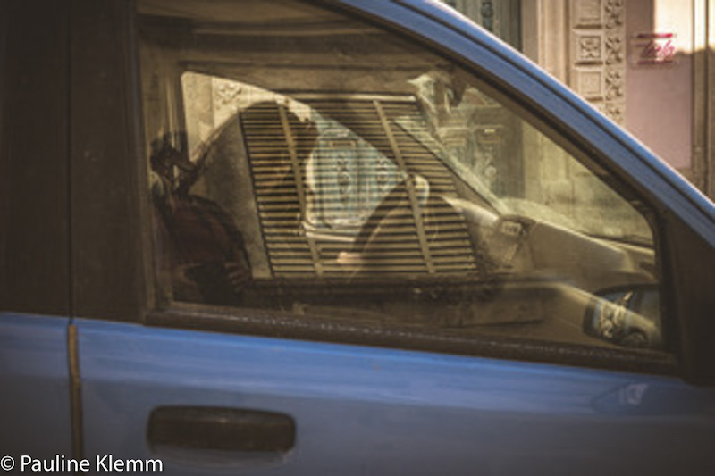 woman in a car by Pauline Klemm